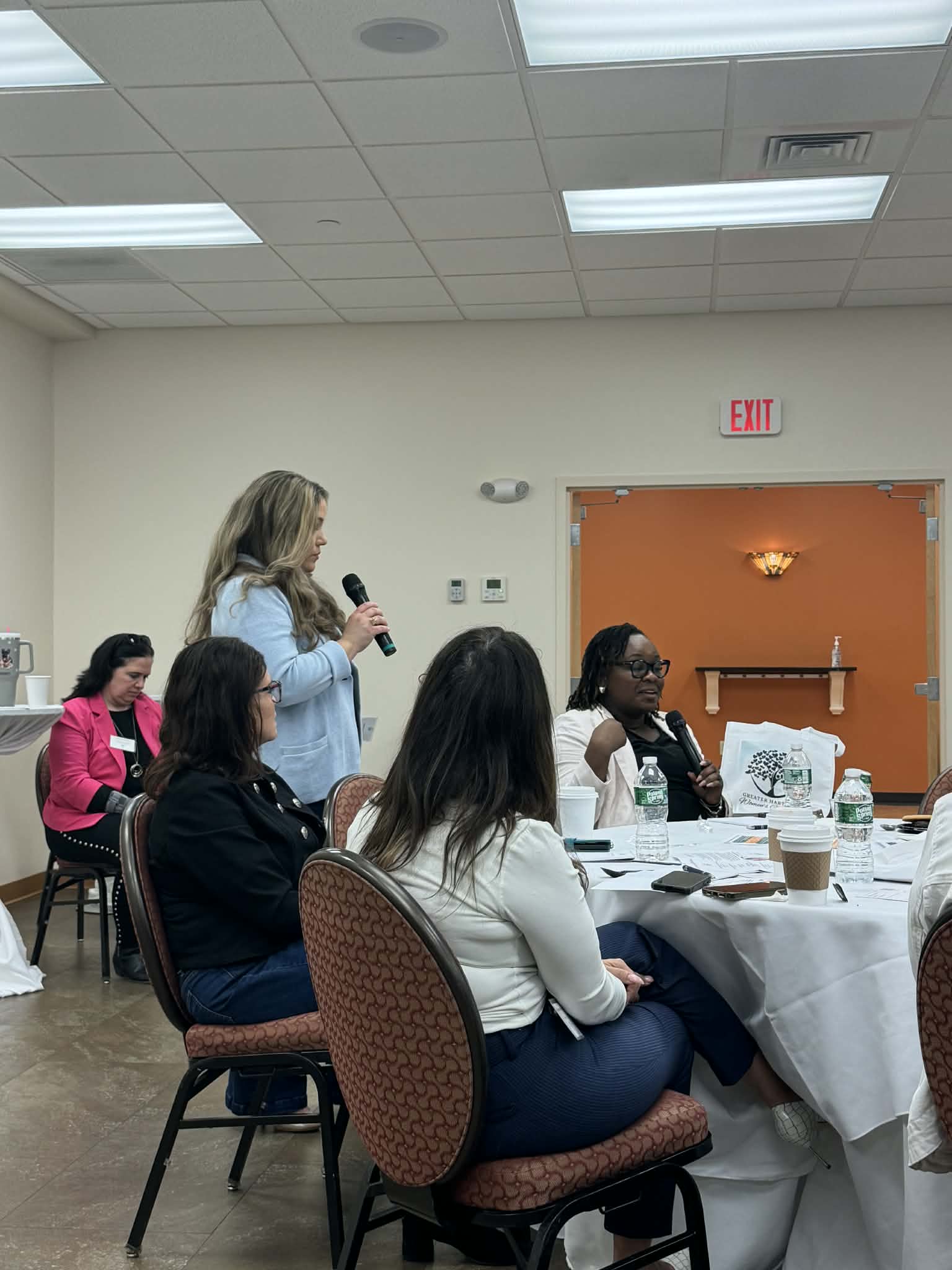Audience attending an Ashley Fernandez speaking event